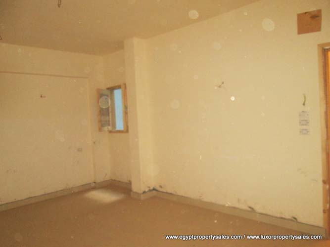 EB2014R Three storey partially finished apartment building fo rent in Luxor