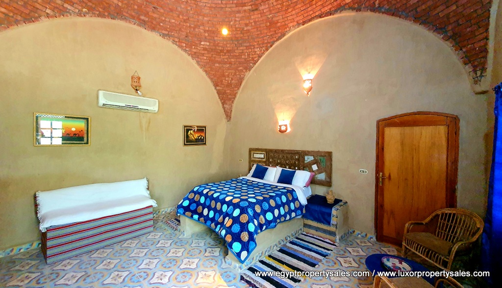 Guest House for sale in West Bank of Luxor Qurna near to mountains with 15 bedroom and air condition in each one