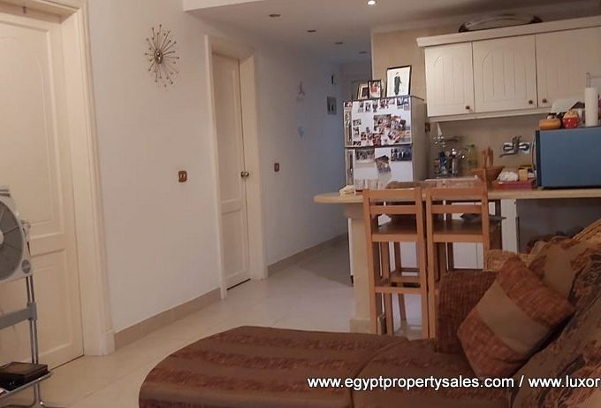 EE2150S Two bedrooms apartment with shared terrace for sale in Luxor city next to Egyptian Experience Luxor Resort